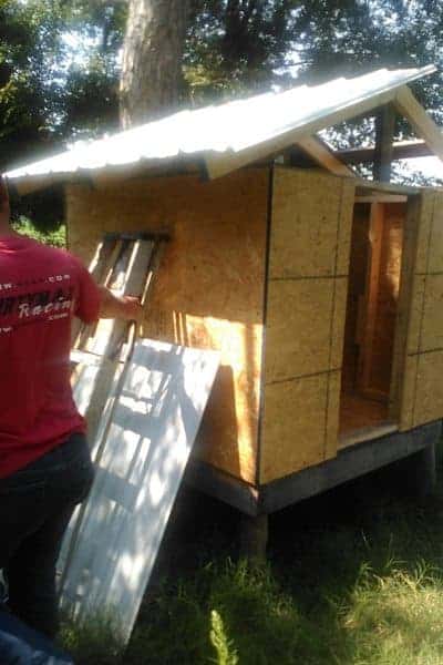 Make your own DIY chicken tractor using these plans and pallet wood. Easy step-by-step plans. From FrugalChicken