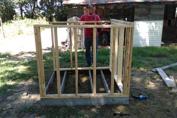 Make your own DIY chicken tractor using these plans and pallet wood. Easy step-by-step plans. From FrugalChicken