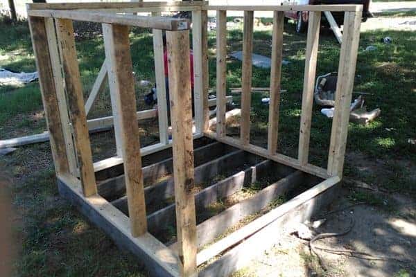 Make your own DIY chicken tractor using these plans and pallet wood. Easy step-by-step plans. From FrugalChicken
